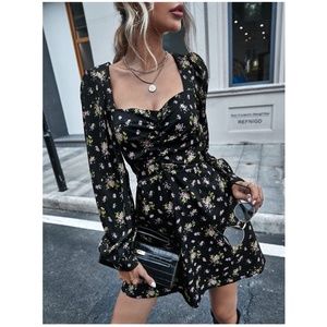 black floral print long sleeve mini dress. boho